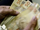 Caixa paga Bolsa Família a beneficiários com NIS de final 4