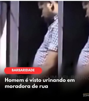 Homem é visto urinando em moradora de rua